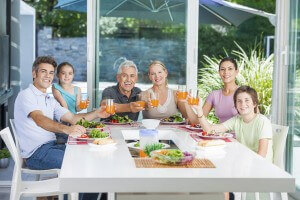 Family enjoying their new sunroom addition to their home in Los Angeles.