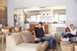 Happy family in a new renovated living room in Southern California.