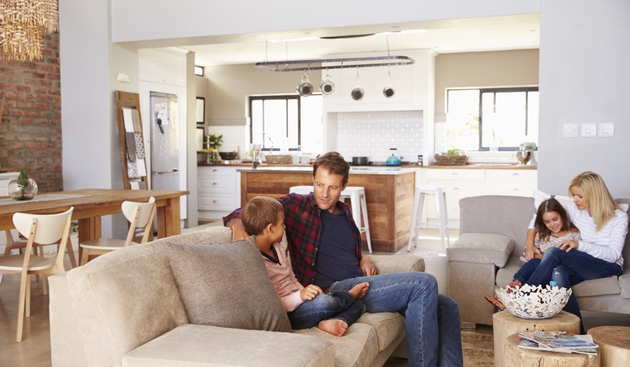 Happy family in a new renovated living room in Southern California.