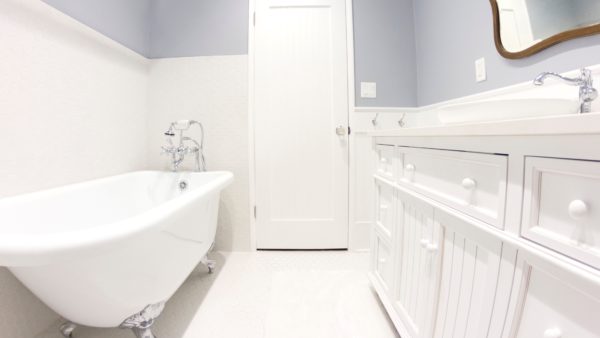 White & grey bathroom remodel & clawfoot tub in Studio City, California