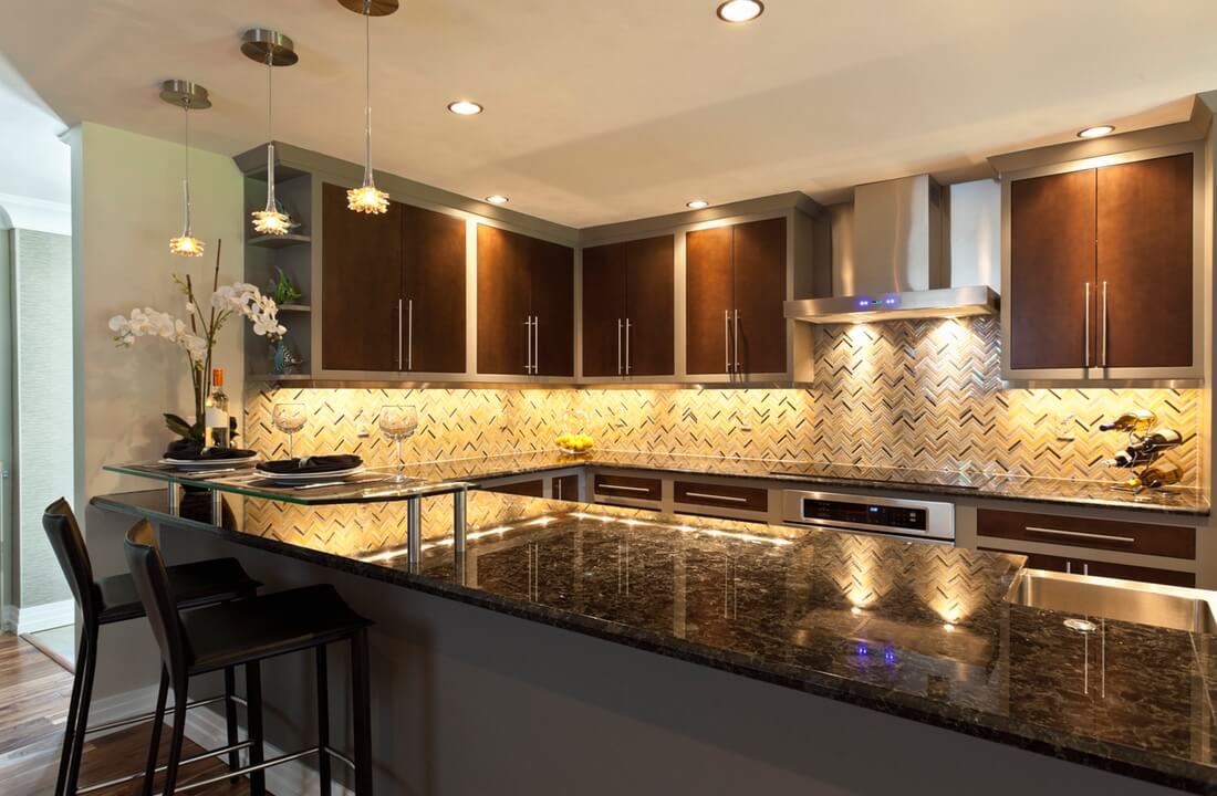 A horseshoe kitchen layout with maximum counter space, part of a kitchen remodel in Los Angeles, California by design-build firm A-List Builders, serving LA.