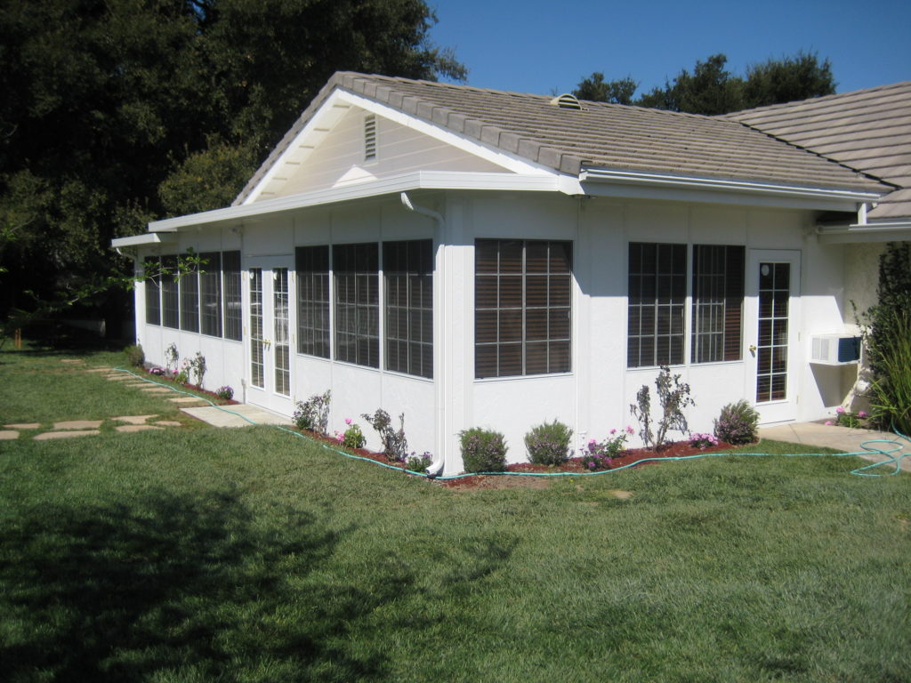 This patio enclosure on a Los Angeles home adds space and light to home living. Choose design-build firm A-List Builders for your patio enclosure home remodel.