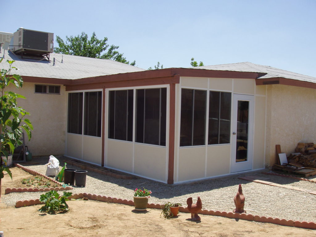 A well integrated patio enclosure in a desert home, built by upscale design-build firm A-List Builders, serving all of Los Angeles.