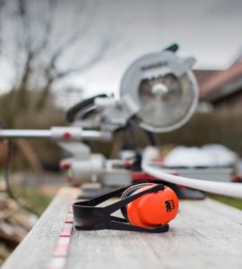 Circular saw & orange noise reduction earmuffs