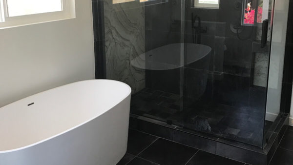 Designer bathroom remodel in Culver City with rustic wood finishes and slate tile floor.