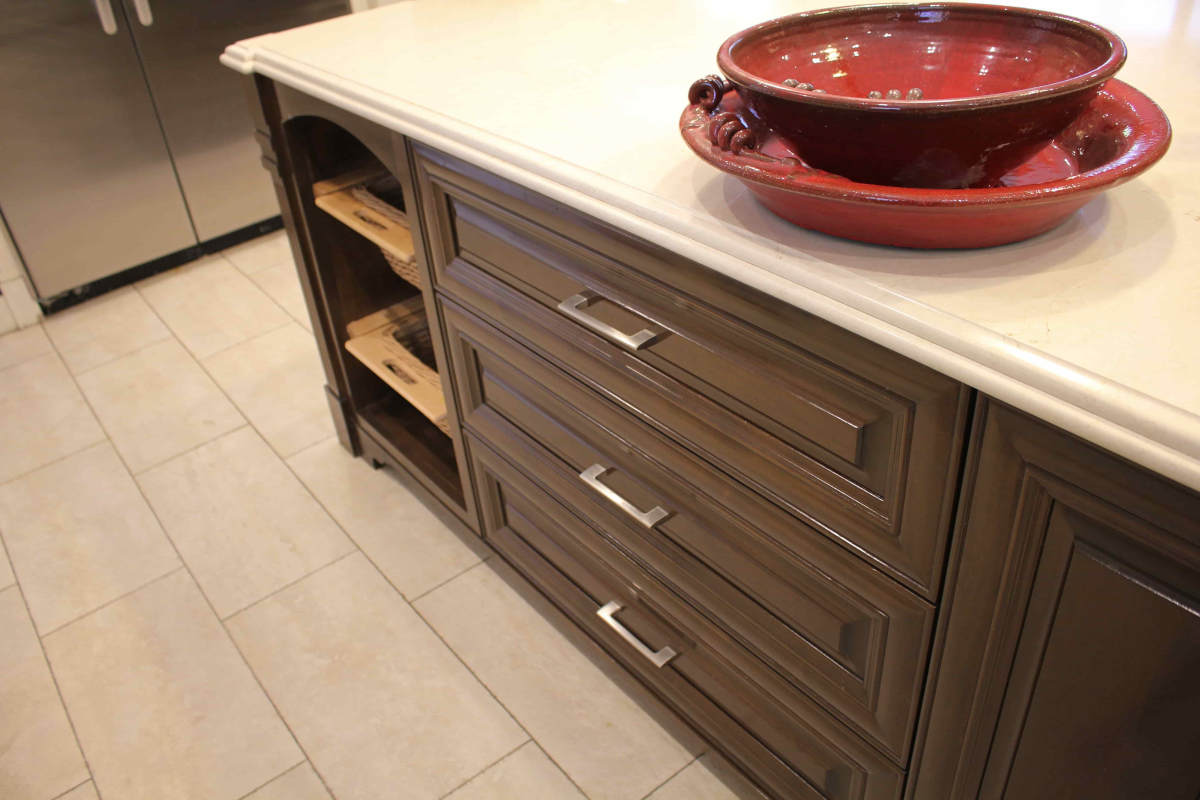 Drawers and shelf space on a kitchen island in a home in Sherman Oaks, CA, part of a complete home remodel by Los Angeles design-build firm A-List Builders.