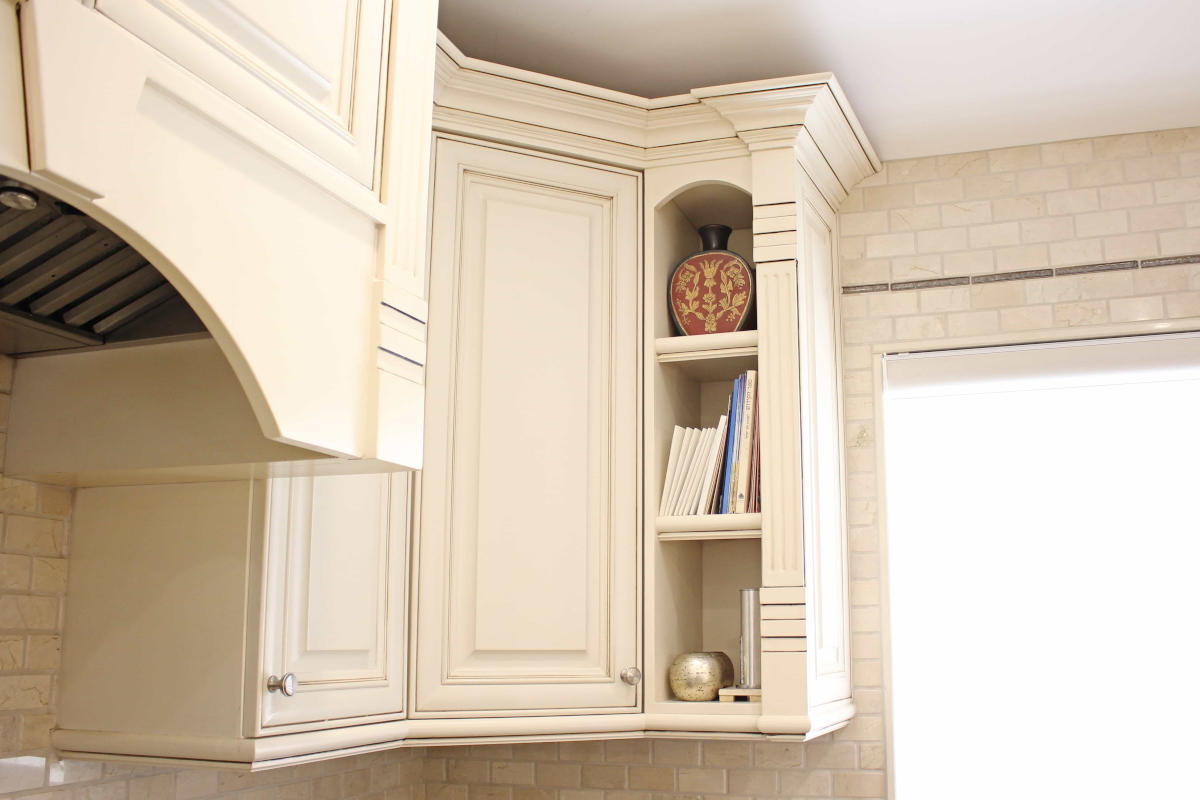 A corner cabinet and shelving in a newly remodeled kitchen at a home in Sherman Oaks, CA, part of a home remodel by LA design-build firm A-List Builders.