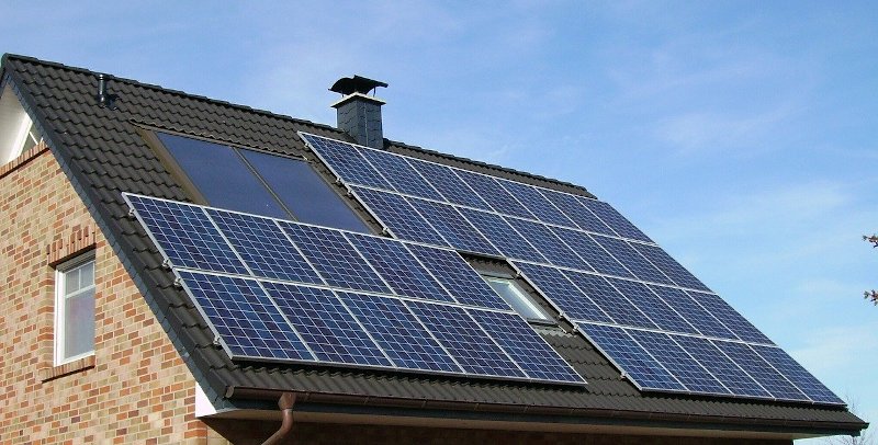 Luxury home upgrade solar paneling on roof