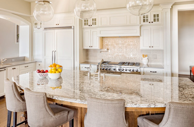 White Interior Dining Area with Round Table and Chairs in a Los Angeles kitchen remodel