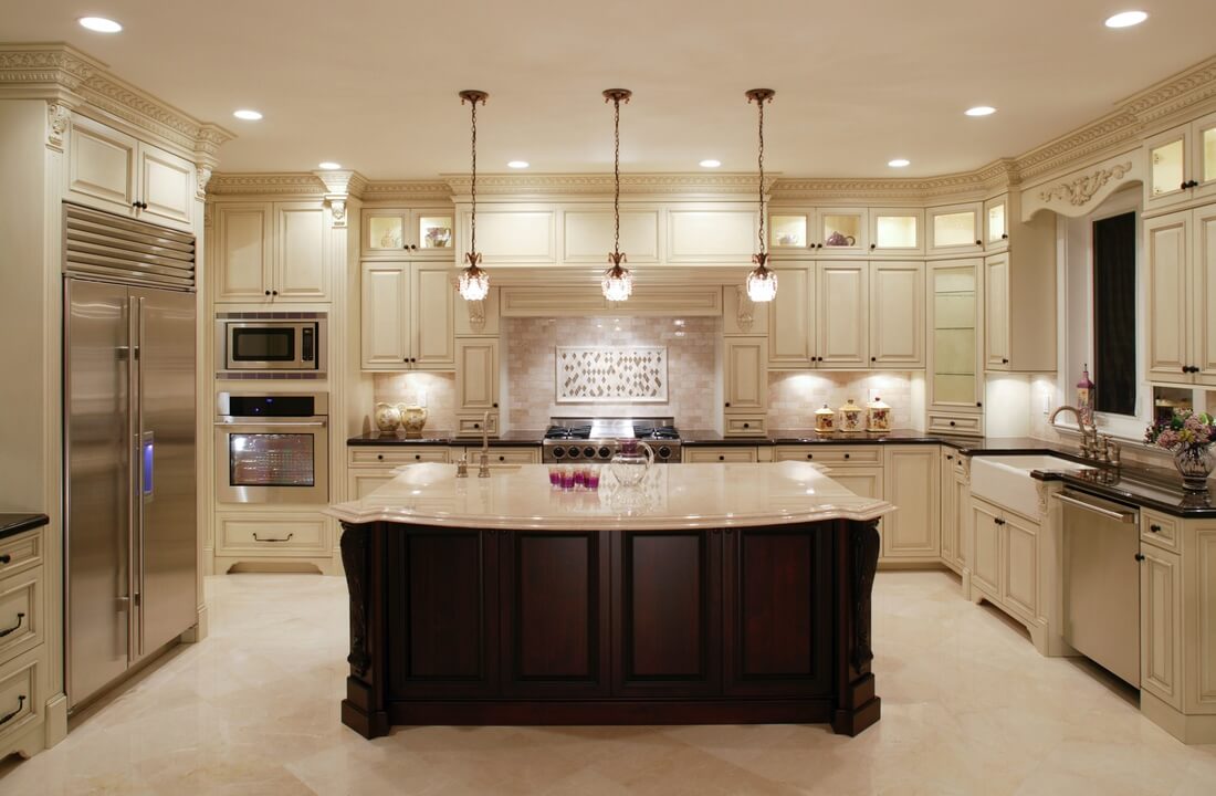 A large kitchen with ornate fixtures and textures, part of a kitchen remodel in Los Angeles, California by design-build firm A-List Builders, which serves LA.