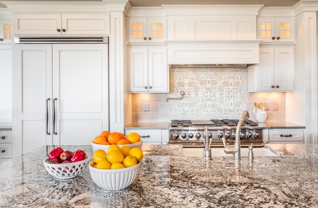 Bowls of fruit sit on an island, part of a kitchen remodel in Los Angeles, California by design-build firm A-List Builders, which serves the greater LA area.
