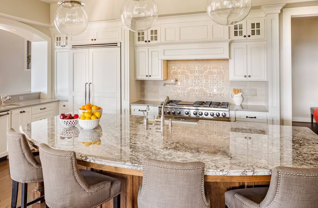 This island has bar seating for four, part of a kitchen remodel in Los Angeles, California by design-build firm A-List Builders, which serves the LA area.