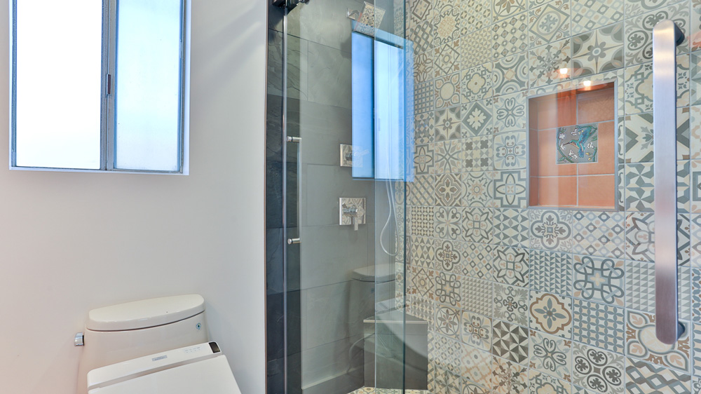 Spanish tile inspired shower wall in a Los Angeles bathroom
